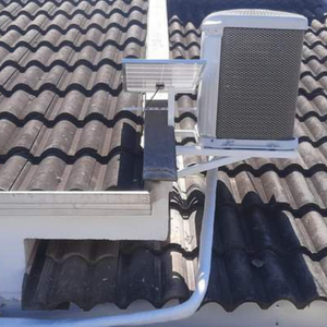 equipamento ar condicionado no telhado residencial